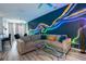 Cozy living room with a comfortable sectional and stylish accents at 4720 Hemingway House St, Kissimmee, FL 34746