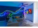 Bright living room with modern decor, neon lighting and comfortable sectional sofa at 4720 Hemingway House St, Kissimmee, FL 34746
