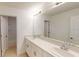 Bright bathroom featuring double sinks, a large mirror, and a clean, modern aesthetic at 4747 Cloister St, Kissimmee, FL 34758