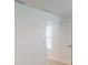 Bright bedroom with a window and door at 4747 Cloister St, Kissimmee, FL 34758