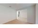 A living room with carpet and ceramic flooring at 4747 Cloister St, Kissimmee, FL 34758