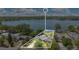 Waterfront house displaying its location, backyard pool, proximity to dock, and nearby neighborhood at 673 Balmoral Rd, Winter Park, FL 32789