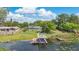 Lakeside home with a private boat dock and spacious backyard, perfect for outdoor activities and enjoying lake views at 673 Balmoral Rd, Winter Park, FL 32789