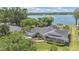Aerial shot highlighting a home’s meticulously landscaped yard and its close proximity to the lake at 673 Balmoral Rd, Winter Park, FL 32789