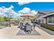 Expansive backyard with comfortable seating and an outdoor dining area, ideal for gatherings and relaxation at 673 Balmoral Rd, Winter Park, FL 32789
