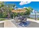 Charming outdoor dining area with scenic views, ideal for entertaining and enjoying the outdoors at 673 Balmoral Rd, Winter Park, FL 32789