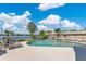 Beautiful backyard pool and waterfront with lounge chairs for ultimate outdoor relaxation and enjoyment at 673 Balmoral Rd, Winter Park, FL 32789