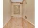 An updated shower features decorative tile work and a shower head at 673 Balmoral Rd, Winter Park, FL 32789