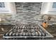 Close-up of a Viking stainless steel gas stove top with a tiled backsplash at 673 Balmoral Rd, Winter Park, FL 32789