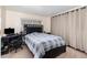 Bedroom with natural light, dark-colored furniture and carpeted floors, for comfort at 690 S Lakemont Ave, Winter Park, FL 32792