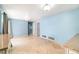 Spacious living room featuring tile floors, light blue walls, and ample natural light at 690 S Lakemont Ave, Winter Park, FL 32792