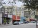 Street view of multi-story apartment complex in downtown area and local businesses at 712 Baffie Ave, Winter Park, FL 32789