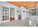 Inviting sunroom with tile floors, wood ceiling, and bright lighting, perfect for relaxing at 712 Baffie Ave, Winter Park, FL 32789