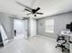 Bedroom with ample natural light, closet, and doorway to the rest of the house at 744 Simone Ct, Haines City, FL 33844