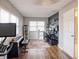 Spacious bonus room with laminate flooring, fresh paint, and bright light at 7714 Lady Frances Way, Orlando, FL 32807