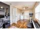 Versatile bonus room featuring laminate flooring, fresh paint, and natural light at 7714 Lady Frances Way, Orlando, FL 32807