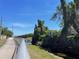 Community walking path and bridge with a canal running alongside at 7714 Lady Frances Way, Orlando, FL 32807