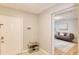 Inviting foyer with a view of living room and updated flooring and fresh paint at 7714 Lady Frances Way, Orlando, FL 32807