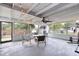 Screened patio provides space for dining and exercise with natural light at 7714 Lady Frances Way, Orlando, FL 32807
