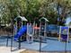 Outdoor playground featuring colorful structures, slides, and climbing areas, perfect for recreation at 7714 Lady Frances Way, Orlando, FL 32807