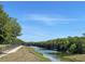 A walking path with metal bridge, a picturesque spot for a peaceful stroll and enjoying scenic views at 7714 Lady Frances Way, Orlando, FL 32807