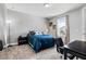 Comfortable bedroom with a large window, carpeting, and a desk, ideal for relaxation or study at 8384 Ludington Cir, Orlando, FL 32836