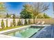Beautiful backyard pool area with well-maintained landscaping, ideal for entertaining or relaxation at 8384 Ludington Cir, Orlando, FL 32836
