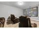 Home theater with comfortable seating and large projection screen for an immersive viewing experience at 8384 Ludington Cir, Orlando, FL 32836