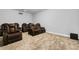Home theater with comfortable seating, ideal for enjoying movies and entertainment at 8384 Ludington Cir, Orlando, FL 32836