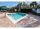 Community hot tub with brick paver surround at 8500 Palm Harbour Dr, Kissimmee, FL 34747
