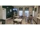 Inviting lounge area with seating, tables, and decorative window treatments, perfect for relaxation at 8500 Palm Harbour Dr, Kissimmee, FL 34747