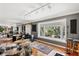 Sun-filled bonus room with studio equipment overlooking private green space, a blend of work and relaxation at 9676 Wild Oak Dr, Windermere, FL 34786