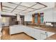 Bright kitchen with white cabinets and granite countertops, great for culinary enthusiasts at 9676 Wild Oak Dr, Windermere, FL 34786