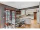 Eat-in kitchen featuring stainless steel vent and direct access to an outdoor seating area at 9676 Wild Oak Dr, Windermere, FL 34786