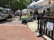Outdoor town market featuring fresh fruits and vegetables, local vendors, and community atmosphere at 9676 Wild Oak Dr, Windermere, FL 34786