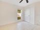 Bedroom featuring a view from the window and a white door at 1002 Kelsey Ave, Oviedo, FL 32765