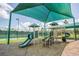 Community playground with slides offers children an active and engaging recreation area at 10176 Hart Branch Cir, Orlando, FL 32832