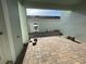 Private backyard featuring a brick-paved patio, perfect for outdoor entertaining and relaxation at 13532 Autumn Harvest Ave, Winter Garden, FL 34787