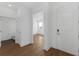 Bright entryway with wood-look floors, leading to other rooms and a view of the living area at 13532 Autumn Harvest Ave, Winter Garden, FL 34787