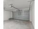 Spacious two-car garage with updated door and ample room for vehicles and storage at 13532 Autumn Harvest Ave, Winter Garden, FL 34787