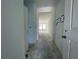 Hallway with ample natural light at 13532 Autumn Harvest Ave, Winter Garden, FL 34787