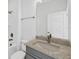 Bathroom featuring granite vanity, updated fixtures, and a shower-tub combo at 13817 Luna Harvest Ave, Winter Garden, FL 34787