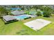 Community amenities featuring a pool, tennis courts, and volleyball area at 13832 Dove Wing Ct, Orlando, FL 32828