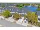 Charming townhome featuring a serene water view and well-maintained landscaping at 13832 Dove Wing Ct, Orlando, FL 32828