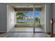 Relaxing screened patio with a beautiful lake view at 13832 Dove Wing Ct, Orlando, FL 32828