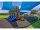 Fun-filled playground with colorful slides, swings, and climbing structures, perfect for to play and explore at 13832 Dove Wing Ct, Orlando, FL 32828