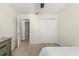 Simple bedroom with closet and door to another room at 1395 Olympic Club Blvd, Champions Gate, FL 33896