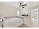 Bright bedroom with ceiling fan, closet and a view to another room at 1395 Olympic Club Blvd, Champions Gate, FL 33896