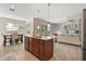 Open concept kitchen flowing into the dining and living areas, perfect for entertaining and Gathering time at 1395 Olympic Club Blvd, Champions Gate, FL 33896