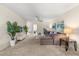 Spacious living room featuring plush carpeting, ceiling fan, and neutral paint at 1395 Olympic Club Blvd, Champions Gate, FL 33896